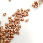 Бусины Matubo MiniDuo Beads, Непрозрачный блестящий Розовое золото, 4х2.5мм, PB307-0204-AK03000